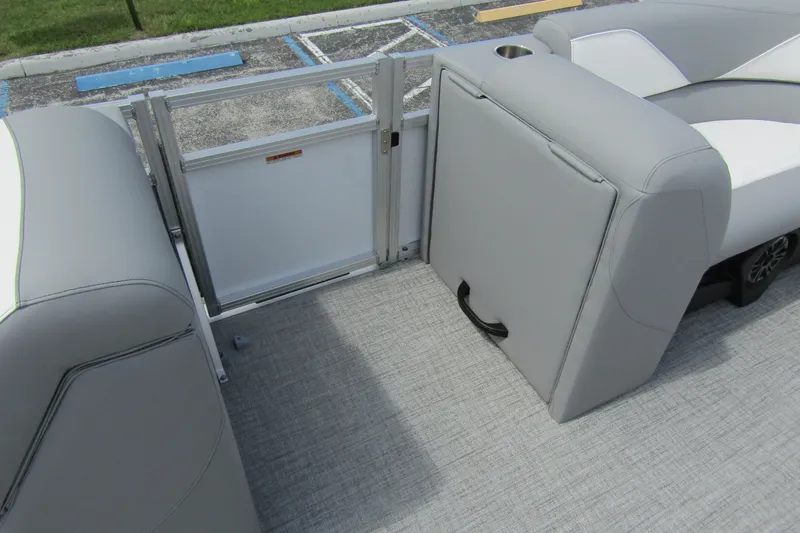 Slide: The Image of 2026 Tahoe Pontoon Sport 85 Versatile Rear Bench interior with gray seating and flooring. - 15
