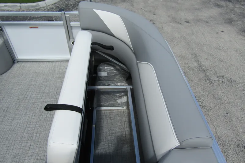 Slide: The Image of 2026 Tahoe Pontoon Sport 85 Versatile Rear Bench with gray seating and storage compartment. - 14