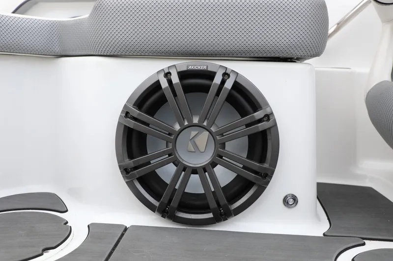 Slide: The Image of 2023 Scarab 195 ID boat featuring a Kicker audio speaker system. - 8