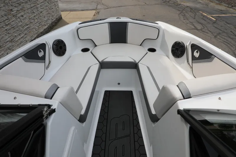 Slide: The Image of Interior of 2023 Scarab 195 ID boat with sleek seating and modern design. - 11