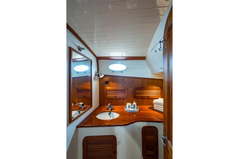 Slide: The Image of Luxurious wooden bathroom interior of 2009 Hinckley Picnic Boat 37 MKIII. - 23