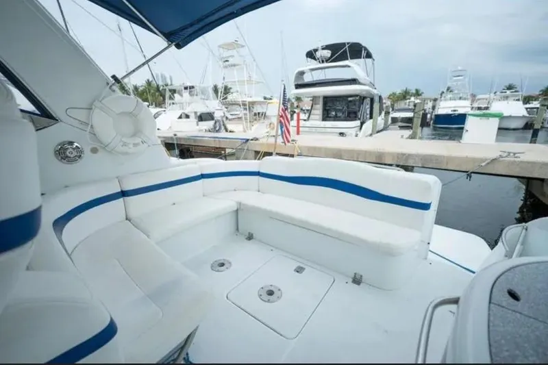 Slide: The Image of 2008 Formula 40 Performance Cruiser interior with white seating, docked at marina. - 15