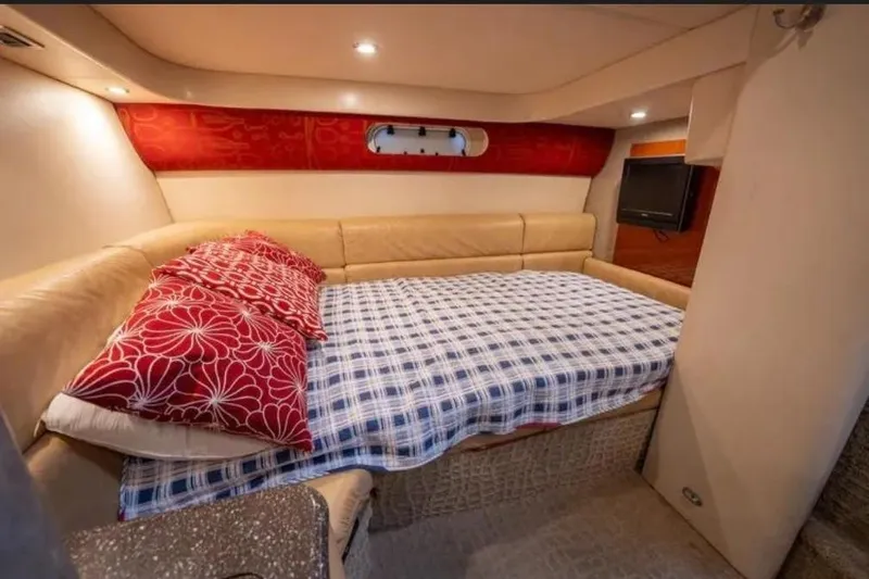 Slide: The Image of Luxurious cabin interior of 2008 Formula 40 Performance Cruiser with cozy bedding and modern decor. - 26