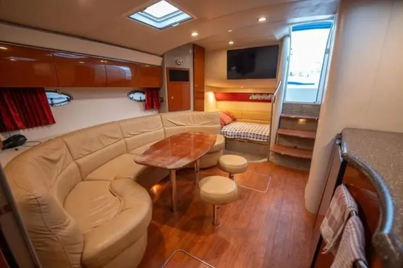 Slide: The Image of Luxurious interior of a 2008 Formula 40 Performance Cruiser with leather seating and wood accents. - 19