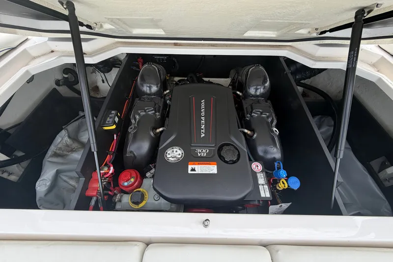 Slide: The Image of The engine compartment of a 2021 Regal LS2 Surf with a Volvo Penta V8 engine. - 14