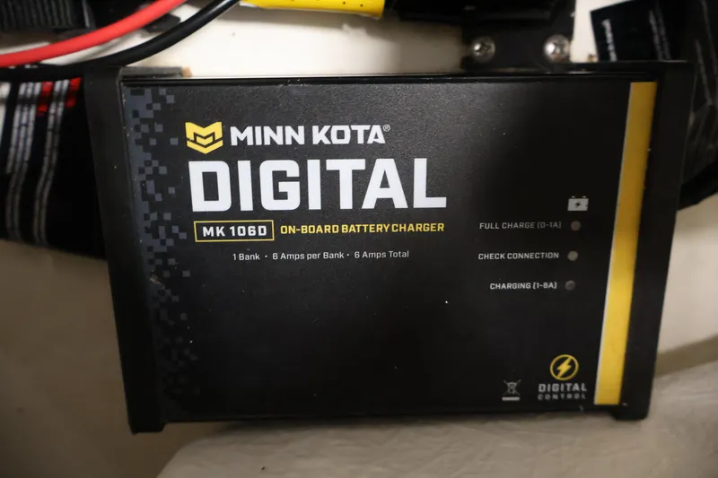 Slide: The Image of Minn Kota MK 106D digital on-board battery charger in Bayliner Element 180 XL, 2015. - 34