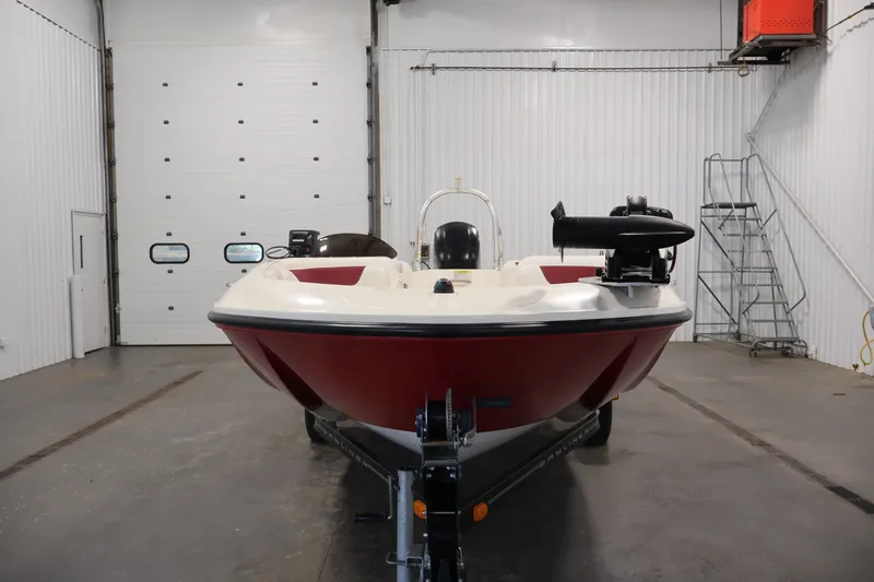 Slide: The Image of 2015 Bayliner Element 180 XL boat in a garage, front view. - 2
