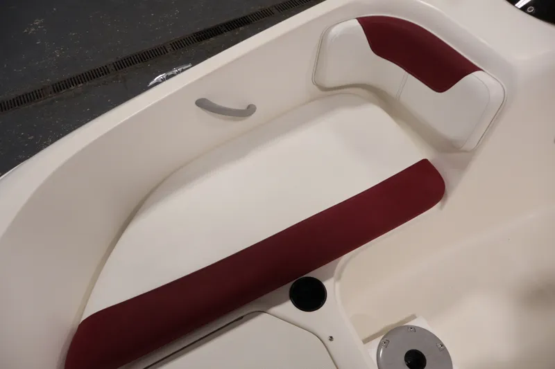 Slide: The Image of 2015 Bayliner Element 180 XL boat interior with red and white seating. - 19