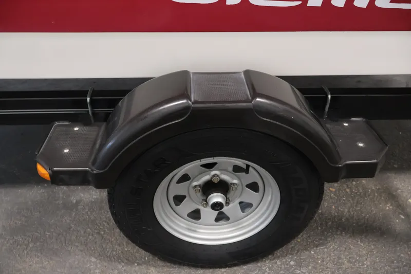 Slide: The Image of Trailer wheel and fender of 2015 Bayliner Element 180 XL boat. - 47