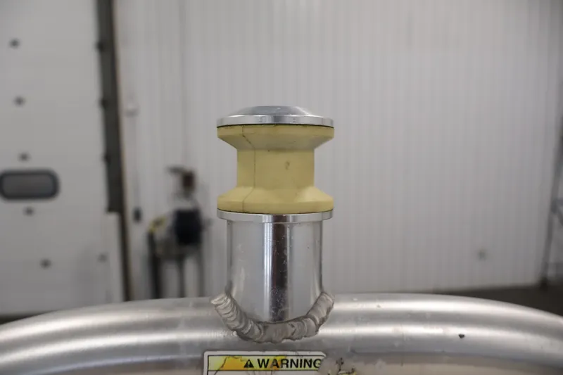 Slide: The Image of Close-up of a Bayliner Element 180 XL 2015 boat cleat in a garage setting. - 40