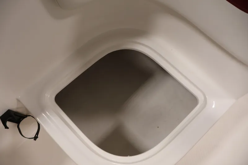 Slide: The Image of Storage compartment in 2015 Bayliner Element 180 XL boat interior. - 31
