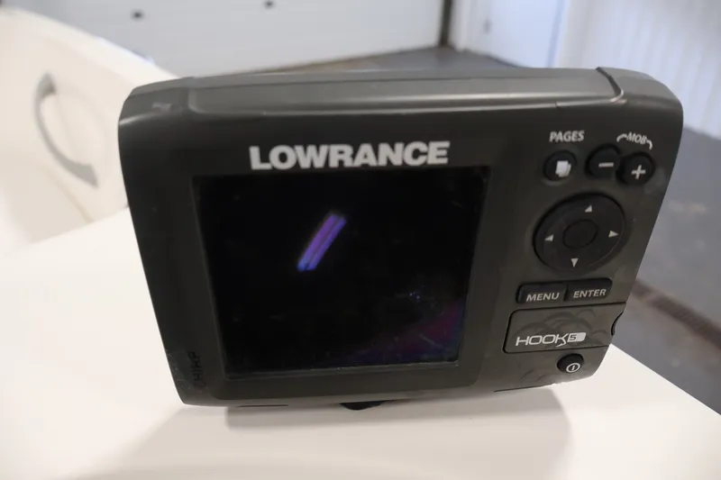 Slide: The Image of Lowrance Hook 5 fish finder on 2015 Bayliner Element 180 XL boat. - 25