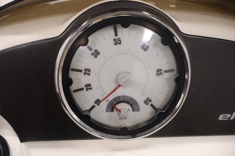 Slide: The Image of Close-up of a 2015 Bayliner Element 180 XL speedometer and voltmeter. - 24