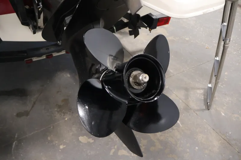 Slide: The Image of Propeller of 2015 Bayliner Element 180 XL boat on display in a showroom. - 44