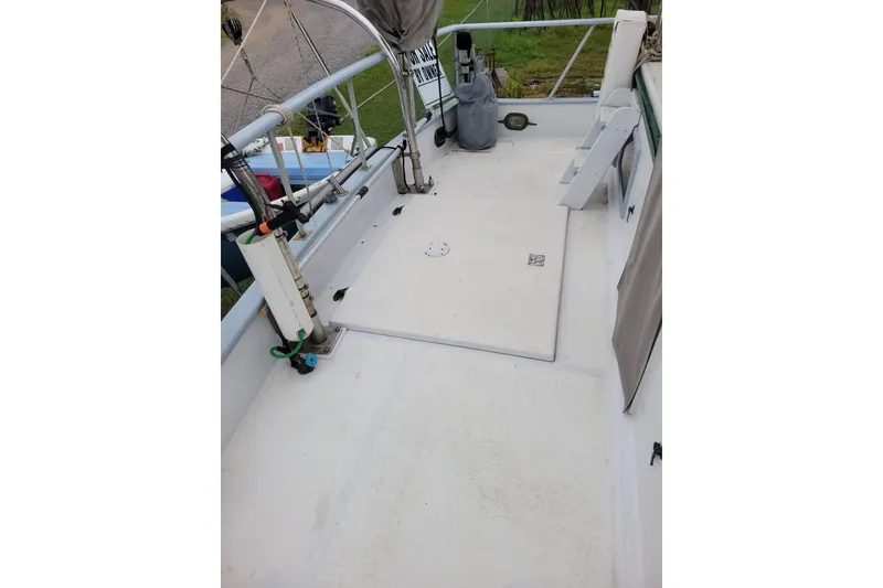 Slide: The Image of 1980 DeFever 41 Trawler deck with railing and equipment. - 15