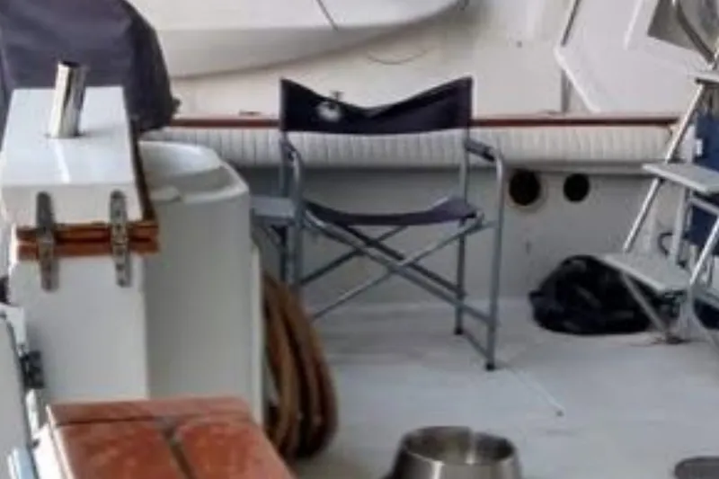 Slide: The Image of Deck of 1988 Chris-Craft 336 Commander with chair and marine equipment. - 19