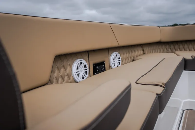 Slide: The Image of Luxurious seating on 2025 Monterey 385SS Super Sport boat with integrated speakers. - 41