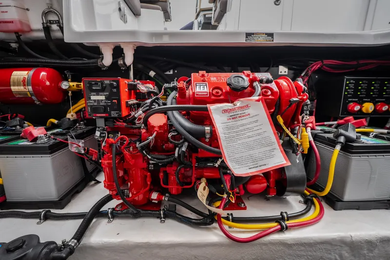 Slide: The Image of Engine compartment of 2025 Monterey 385SS Super Sport with red machinery and wiring. - 60