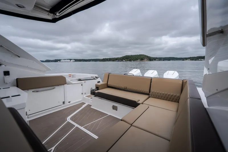 Slide: The Image of Luxurious seating on 2025 Monterey 385SS Super Sport yacht with scenic lake view. - 55