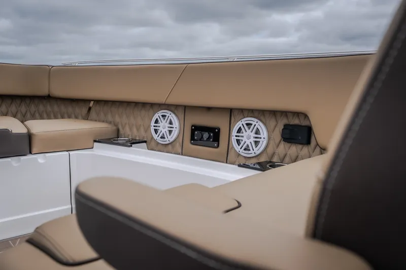 Slide: The Image of Luxurious interior of 2025 Monterey 385SS Super Sport boat with premium seating and speakers. - 40