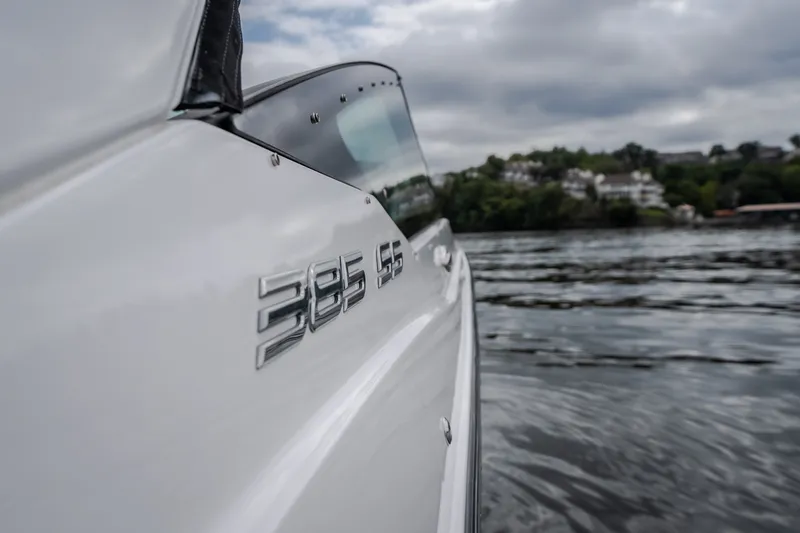 Slide: The Image of 2025 Monterey 385SS Super Sport boat on water, showcasing sleek design and branding. - 8