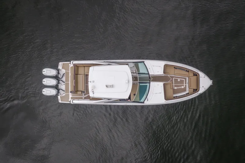 Slide: The Image of Aerial view of 2025 Monterey 385SS Super Sport boat on water. - 6