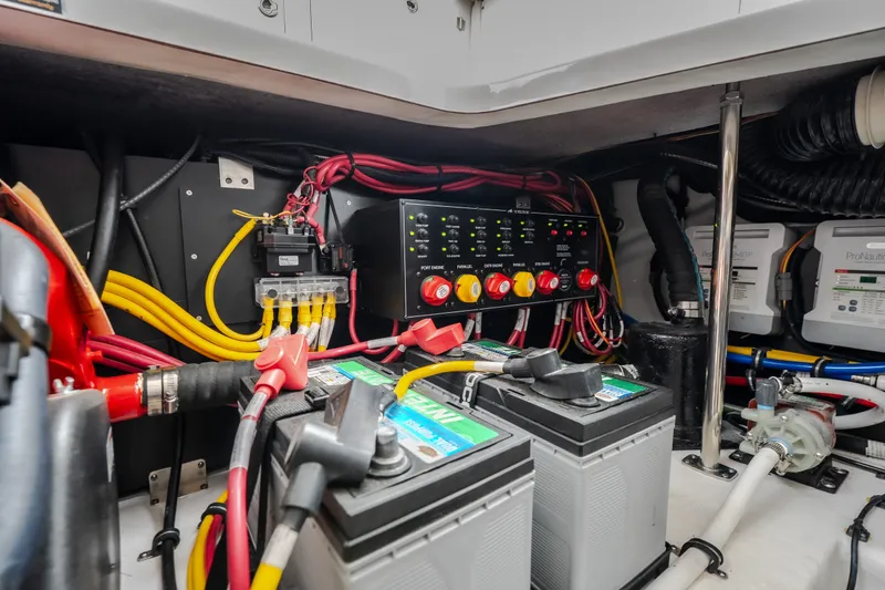 Slide: The Image of Electrical system of a 2025 Monterey 385SS Super Sport boat, featuring batteries and wiring. - 61