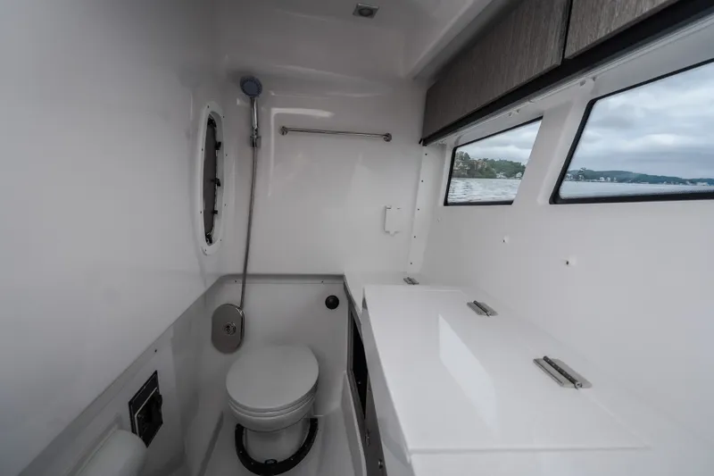 Slide: The Image of Luxurious bathroom interior of 2025 Monterey 385SS Super Sport boat with modern fixtures. - 33