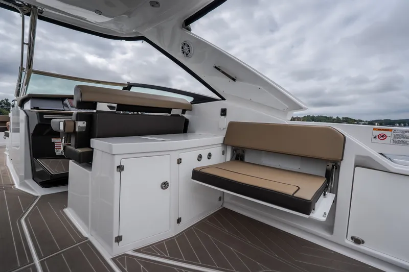 Slide: The Image of 2025 Monterey 385SS Super Sport boat interior with sleek seating and modern design. - 12