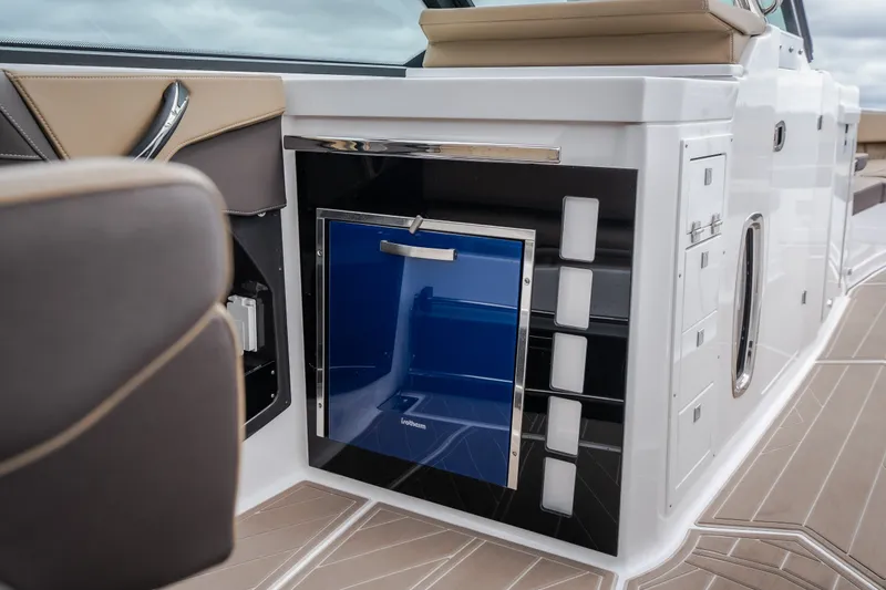 Slide: The Image of Interior of 2025 Monterey 385SS Super Sport boat with sleek cabinetry and modern design. - 36