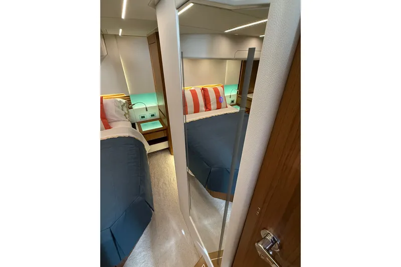 Slide: The Image of Luxurious cabin interior of 2026 Tiara Yachts EX 54 with modern decor. - 31