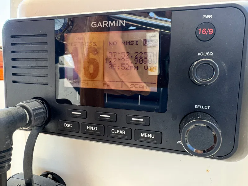 Slide: The Image of A Garmin radio with various controls and a display showing coordinates. - 21