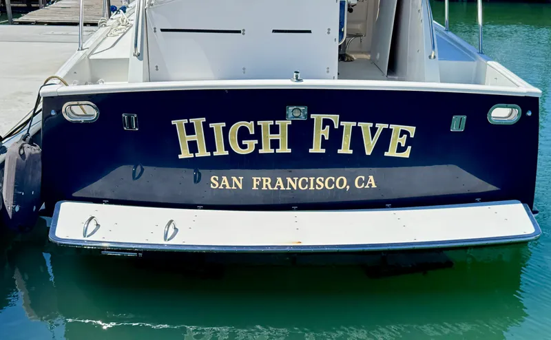 Slide: The Image of The stern of a boat named "High Five" with home port San Francisco, CA. - 12