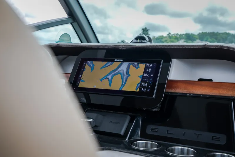 Slide: The Image of Dashboard of 2026 Monterey Elite 30 OB with navigation display. - 23