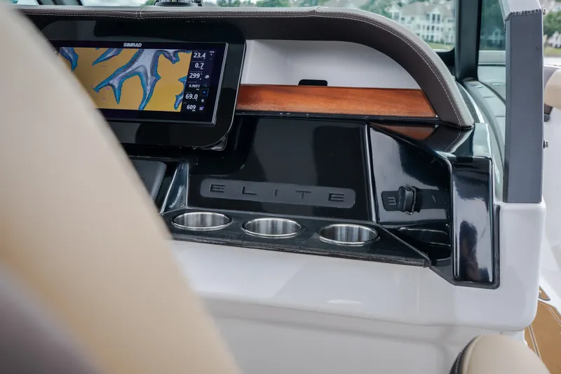 Slide: The Image of Dashboard of 2026 Monterey Elite 30 OB boat with navigation display. - 22