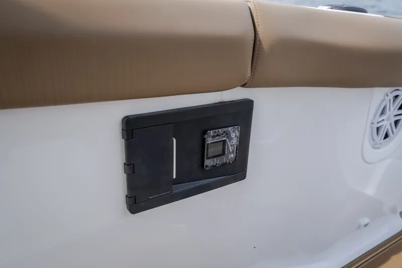 Slide: The Image of Control panel on 2026 Monterey Elite 30 OB boat with beige upholstery. - 58