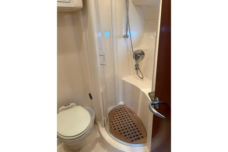 Slide: The Image of Bathroom interior of 2005 Sea Ray 480 Motor Yacht with shower and toilet. - 11