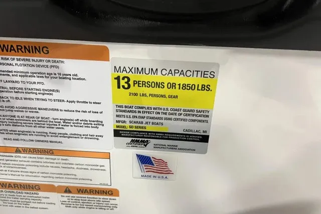 Slide: The Image of Sign shows maximum capacity of 13 persons or 1850 pounds for Scarab 255 LX, year 2025. - 23