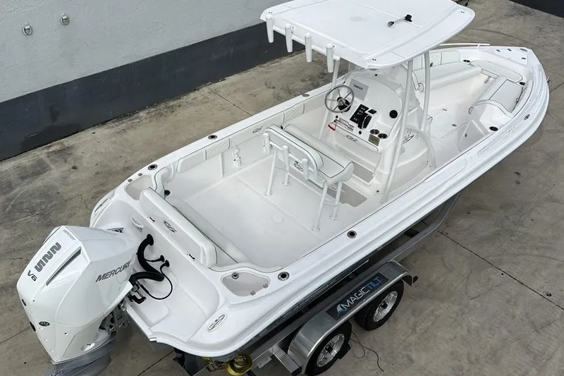 Slide: The Image of 2025 Glassream 240 CCX boat with Mercury engine on trailer, viewed from above. - 8