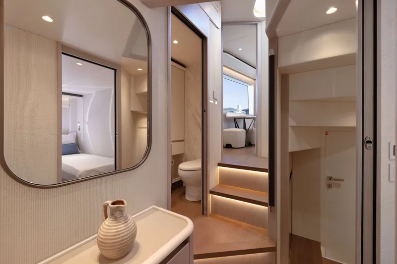 Slide: The Image of Luxurious interior of 2027 Absolute Navetta 62 yacht, featuring elegant design and modern amenities. - 36