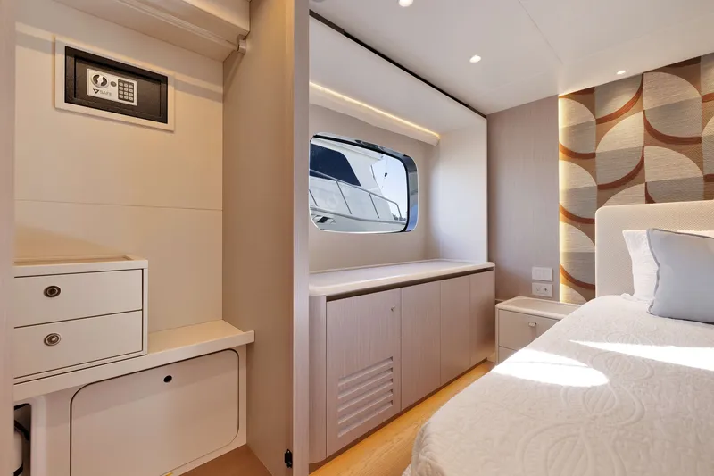 Slide: The Image of Luxurious interior of 2027 Absolute Navetta 62 yacht with modern design and elegant furnishings. - 49