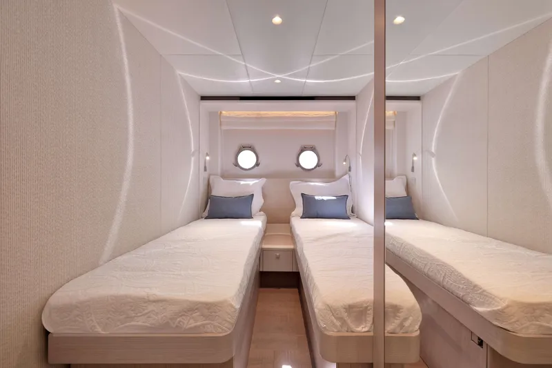 Slide: The Image of Luxurious twin cabin interior of 2027 Absolute Navetta 62 yacht with modern design. - 37