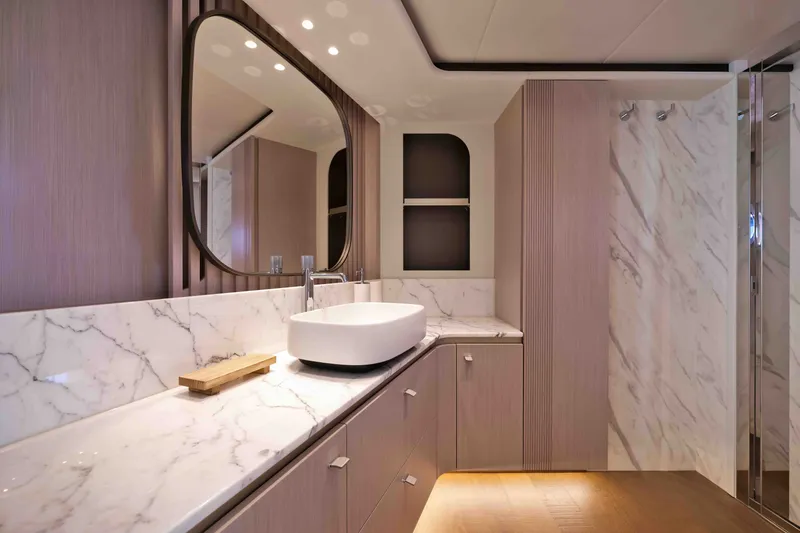 Slide: The Image of Luxurious bathroom interior of 2027 Absolute Navetta 62 yacht with marble accents. - 20