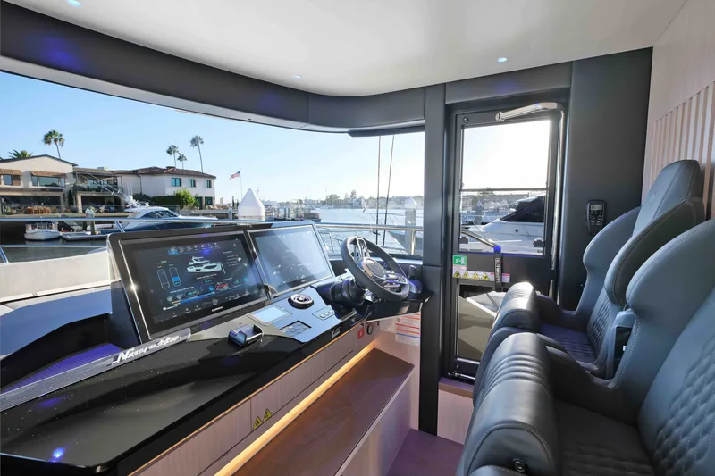 Slide: The Image of Luxurious helm of 2027 Absolute Navetta 62 yacht with advanced navigation systems. - 23