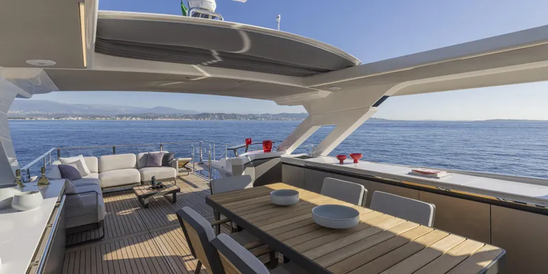 Slide: The Image of Luxurious 2025 Absolute NAVETTA 75 yacht with spacious deck and ocean view. - 17