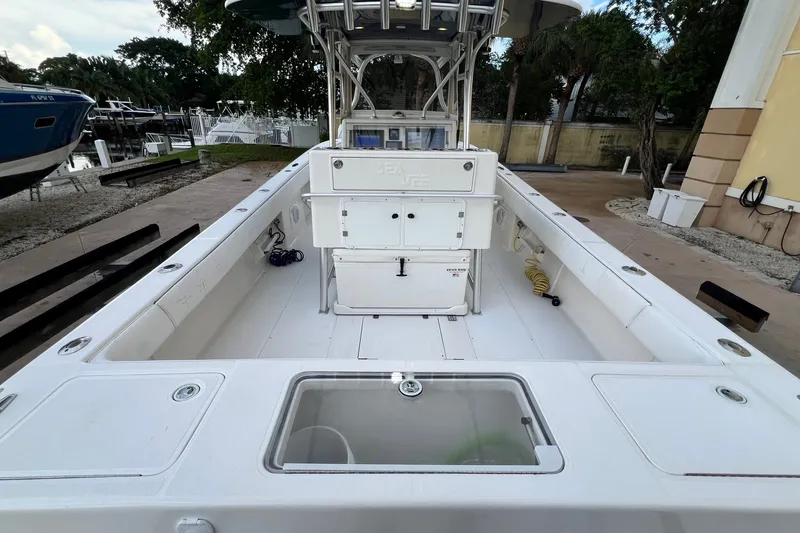 Slide: The Image of 2007 SeaVee 340B Open boat interior, featuring spacious deck and storage compartments. - 28