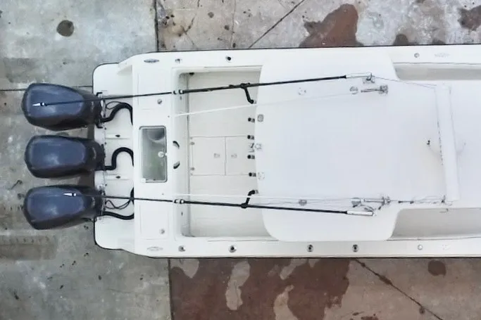 Slide: The Image of Top view of 2007 SeaVee 340B Open boat with triple outboard engines. - 24