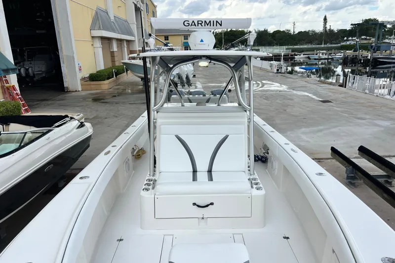 Slide: The Image of 2007 SeaVee 340B Open boat at marina, featuring Garmin equipment and sleek design. - 78