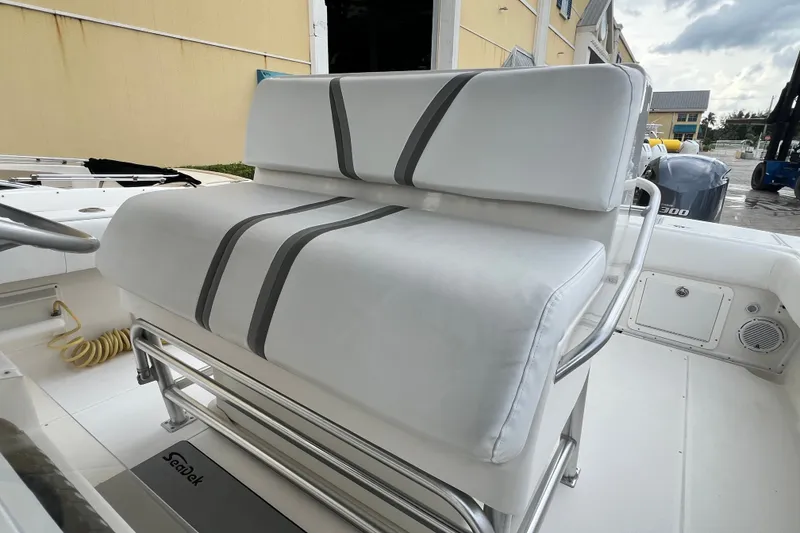 Slide: The Image of 2007 SeaVee 340B Open boat with cushioned seating and sleek design. - 104