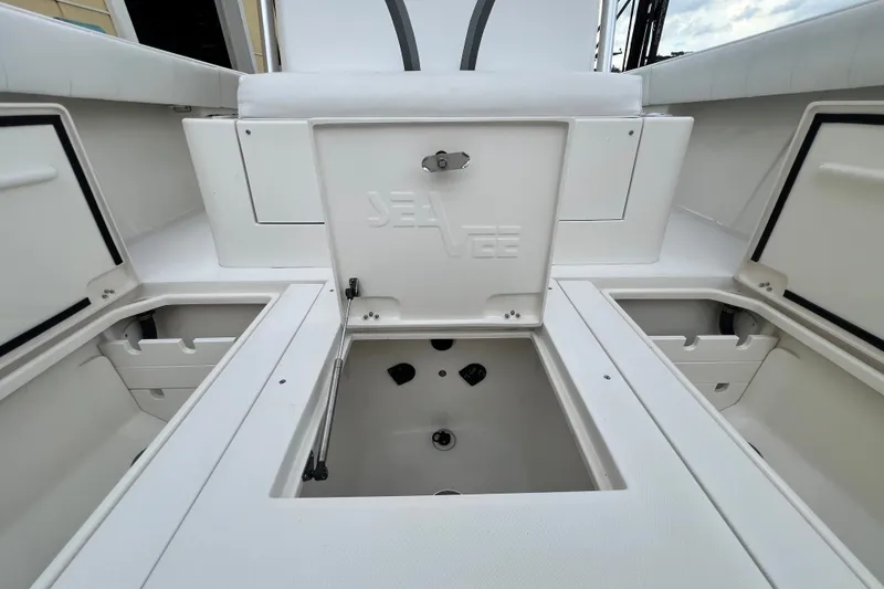 Slide: The Image of 2007 SeaVee 340B Open boat interior with storage compartments and seating. - 92